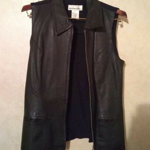 100% leather vest w/spandex back